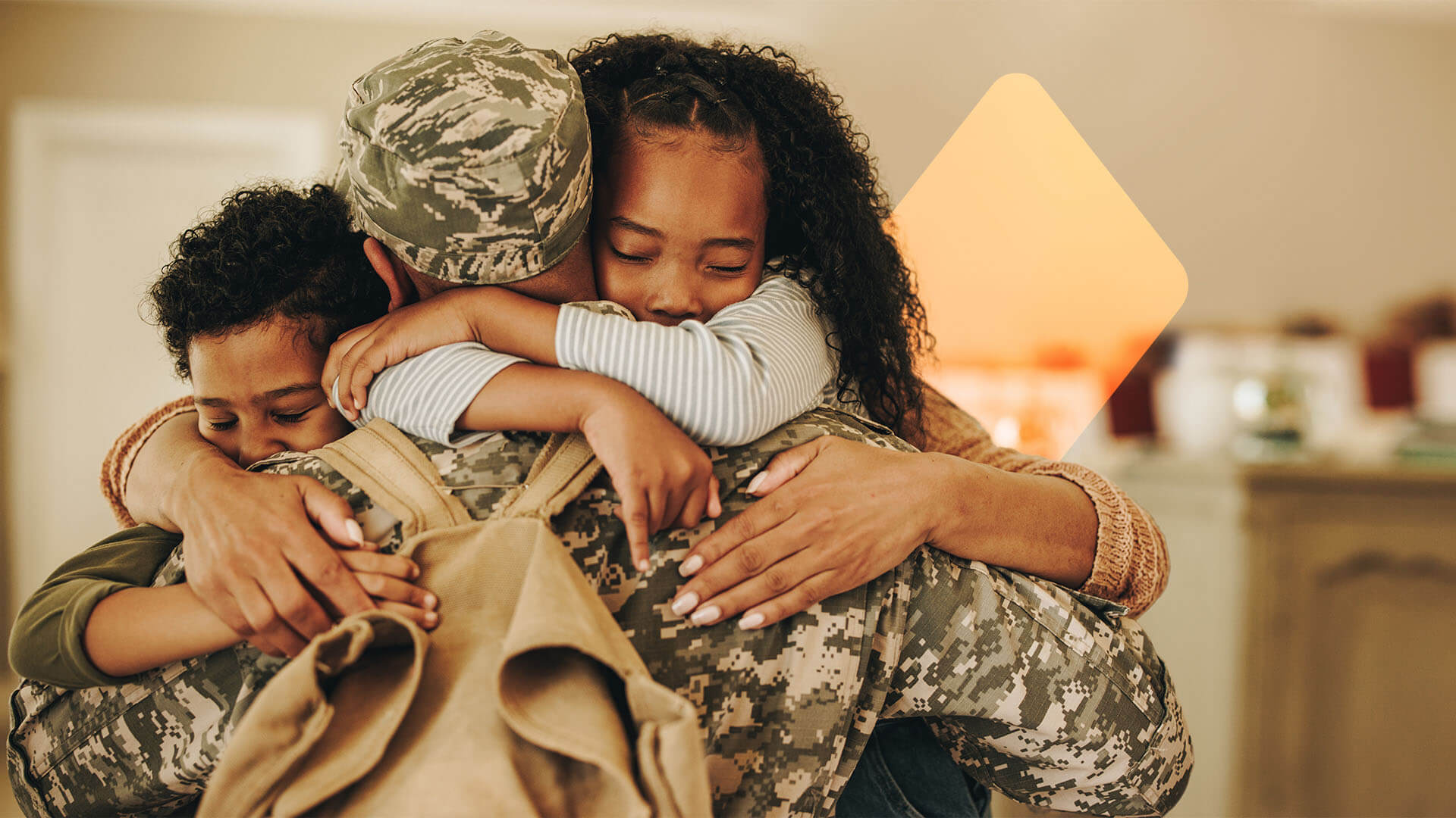 Military family standing together outside their home, ready for a PCS move