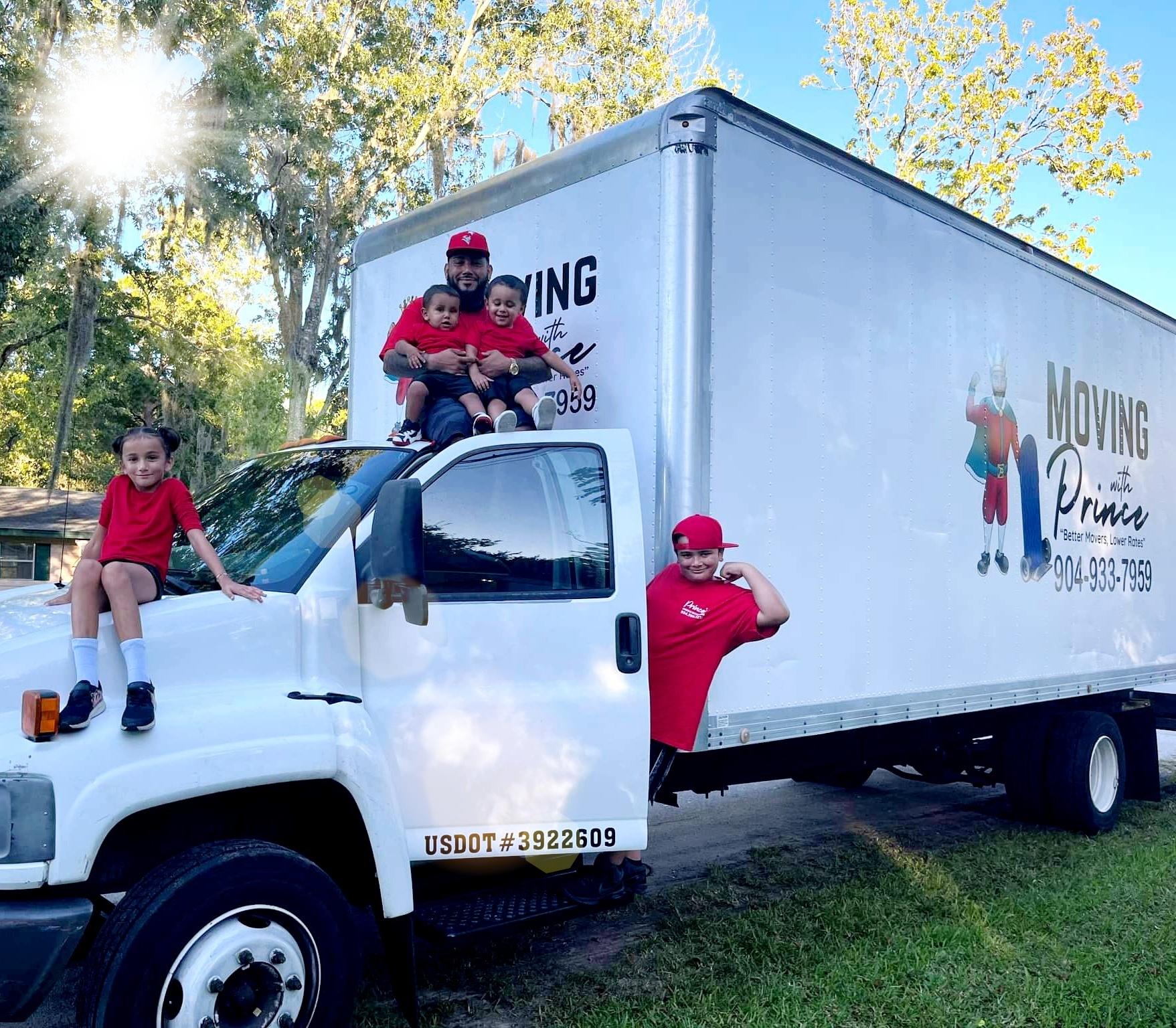 Moving With Prince owner and family on the company moving truck